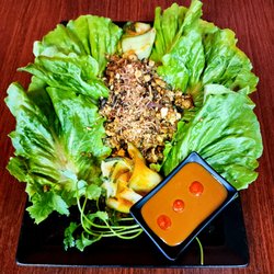 Pho King Wing - A Lettuce Wrap with peanut Sauce.