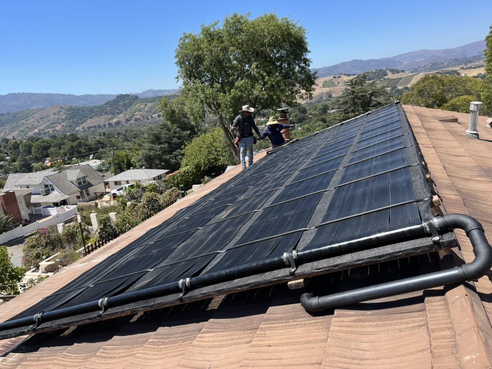 Slide of Pool Solar and Roofing