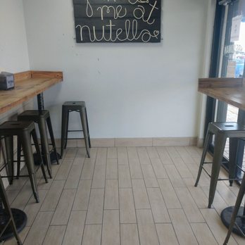 Breadman Miami - Cute sign and seating area - Bakeries Near Me - Hialeah, Florida