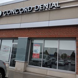 Concord Dental - Out front from the parking lot. Doorway to the left of the gray pillar. June 2019
