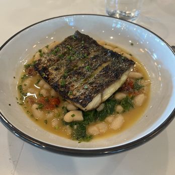 Local Provisions - Sea bass entree- very delicious, smoky undertones from the woodfire oven. - Italian Near Me - Sterling, Virginia Local Provisions - Sea bass entree- very delicious, smoky undertones from the woodfire oven. - Italian Near Me - Sterling, Virginia