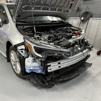 ABC Auto Works - Front-end damage repair in progress, addressing impact-related issues to restore proper fit, function, and appearance. - Auto Repair Near Me - Boston, Massachusetts ABC Auto Works - Front-end damage repair in progress, addressing impact-related issues to restore proper fit, function, and appearance. - Auto Repair Near Me - Boston, Massachusetts