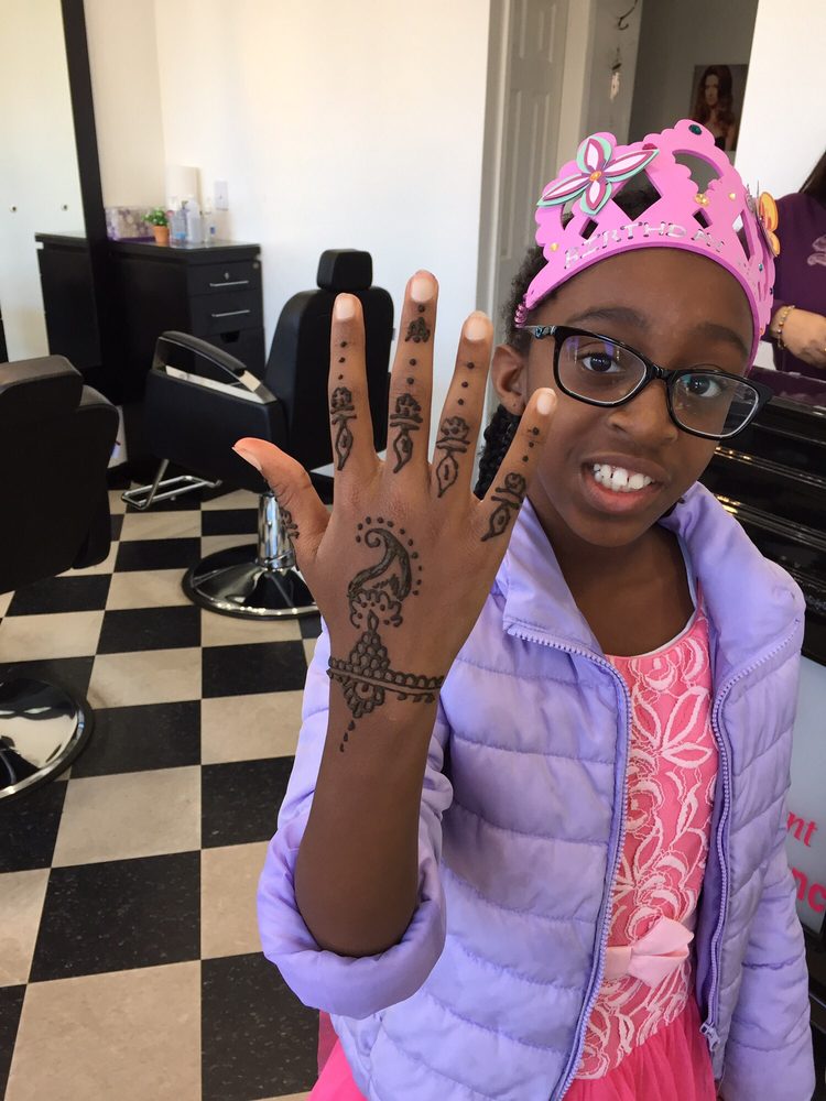 Ruby Elegant Beauty Salon Logo