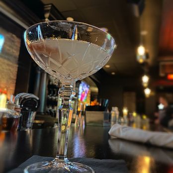 No Vacancy - a martini glass on a bar - New American Near Me - Chicago, Illinois No Vacancy - a martini glass on a bar - New American Near Me - Chicago, Illinois