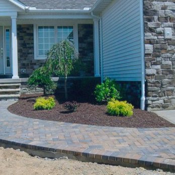 Turf Trimmers Landscaping - a house with a brick walkway - Landscaping Near Me - Kent, Ohio Turf Trimmers Landscaping - a house with a brick walkway - Landscaping Near Me - Kent, Ohio