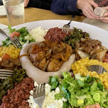 Sheba Ethiopian Restaurant - I believe we got the Vegetarian Sampler with a couple of meat add-ons - Ethiopian Near Me - Rockville, Maryland Sheba Ethiopian Restaurant - I believe we got the Vegetarian Sampler with a couple of meat add-ons - Ethiopian Near Me - Rockville, Maryland