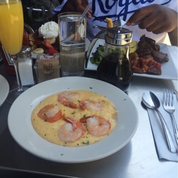 Cornerstone Tavern - Shrimp & Grits , Steak & Eggs across the table & the tastiest mimosas . - Sports Bars Near Me - New York, New York