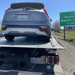 Our car got a flat and no spare tire Our car got a flat and no spare tire