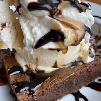 Boathouse 19 - Brownie with ice cream and whipped cream. Gooey fudgy center...Mmmm - Bars Near Me - Tacoma, Washington Boathouse 19 - Brownie with ice cream and whipped cream. Gooey fudgy center...Mmmm - Bars Near Me - Tacoma, Washington