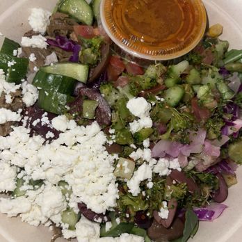 CAVA - Build your own bowl with half steak and half braised lamb - Mediterranean Near Me - Dallas, Texas