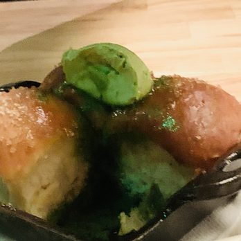 Coastal Kitchen - Sweet bread hot and freshly made with herb pesto butter and sugar topping - New American Near Me - Dana Point, California