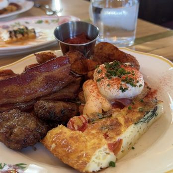 Supperland - My sampler plate; frittata of the day, homemade sausage, bacon, breakfast potatoes, and eggs Benedict. Everything was fabulous! - Southern Near Me - Charlotte, North Carolina Supperland - My sampler plate; frittata of the day, homemade sausage, bacon, breakfast potatoes, and eggs Benedict. Everything was fabulous! - Southern Near Me - Charlotte, North Carolina