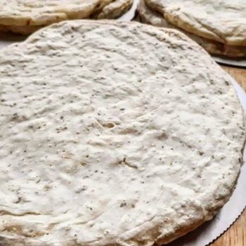 Red Poppy Bakery - three uncooked pizzas - Bakeries Near Me - Kalispell, Montana Red Poppy Bakery - three uncooked pizzas - Bakeries Near Me - Kalispell, Montana