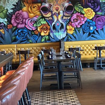 Naco Taqueria - a colorful mural on the wall - Mexican Near Me - Boston, Massachusetts Naco Taqueria - a colorful mural on the wall - Mexican Near Me - Boston, Massachusetts