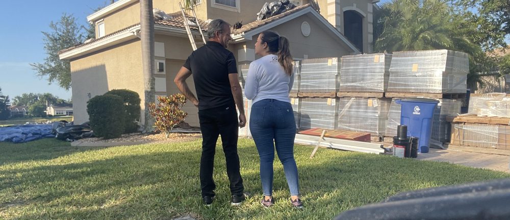 Slide of D’ Roofing Group