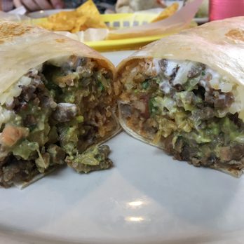La Salsa Mexican Cuisine - The XL Burrito. Did it take two hands to hold? Yes it did. Great size for a burrito - Mexican Near Me - Detroit, Michigan La Salsa Mexican Cuisine - The XL Burrito. Did it take two hands to hold? Yes it did. Great size for a burrito - Mexican Near Me - Detroit, Michigan