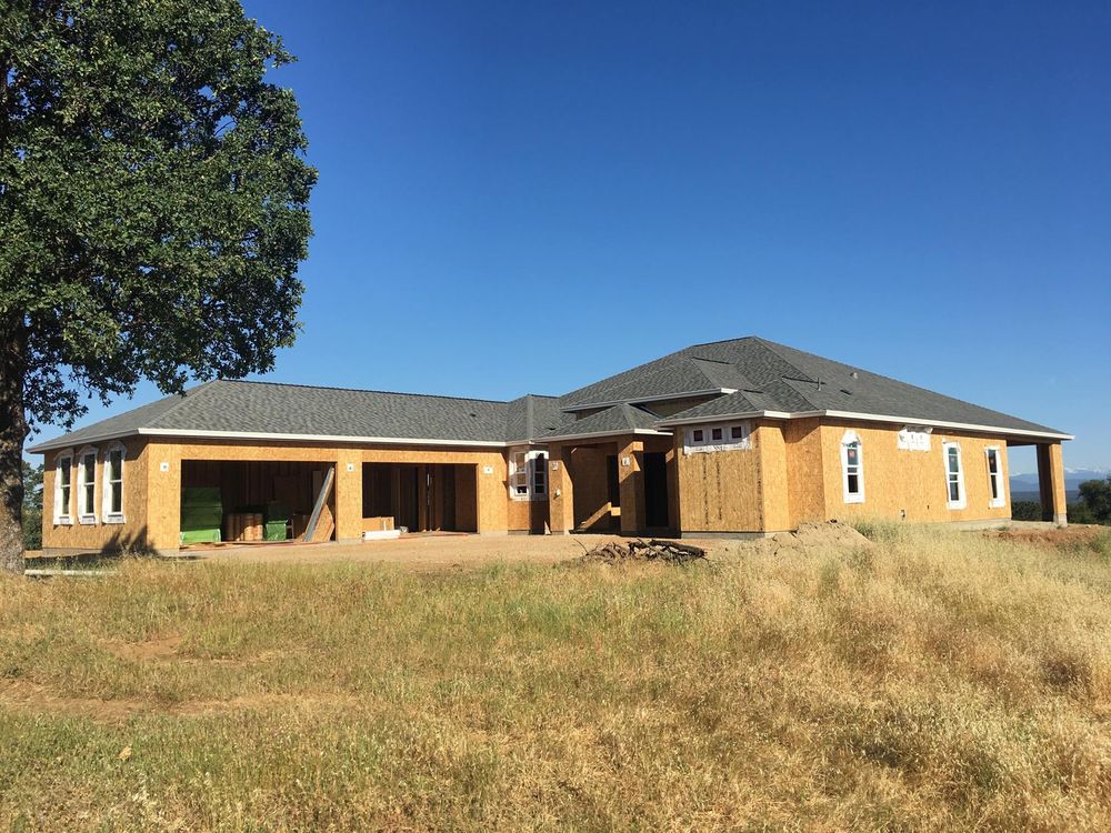 Slide of Tugwell Roofing