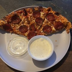Bash's - New to town and WOW the crust tastes homemade and has the slightest crisp to it. Ordered a few many times now and I'll definitely be back!