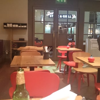 Gourmet Burger Kitchen - The seating in rows - Burgers Near Me - London, XGL Gourmet Burger Kitchen - The seating in rows - Burgers Near Me - London, XGL