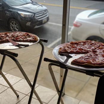 Vince's New York Pizza - two pizzas on a table in front of a window - Pizza Near Me - Smithsburg, Maryland Vince's New York Pizza - two pizzas on a table in front of a window - Pizza Near Me - Smithsburg, Maryland