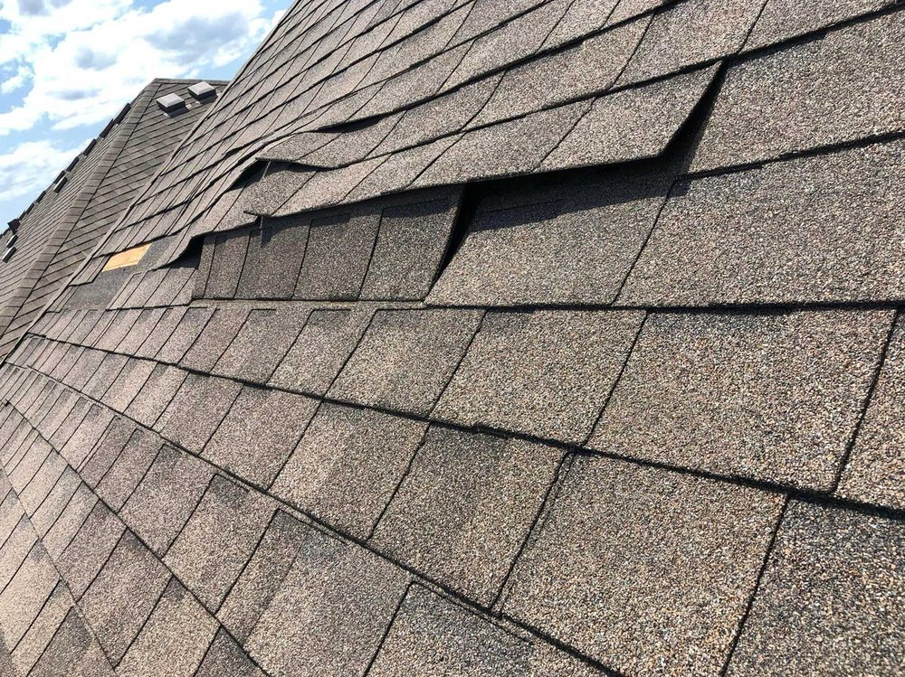 Slide of Lummus Park Roofing