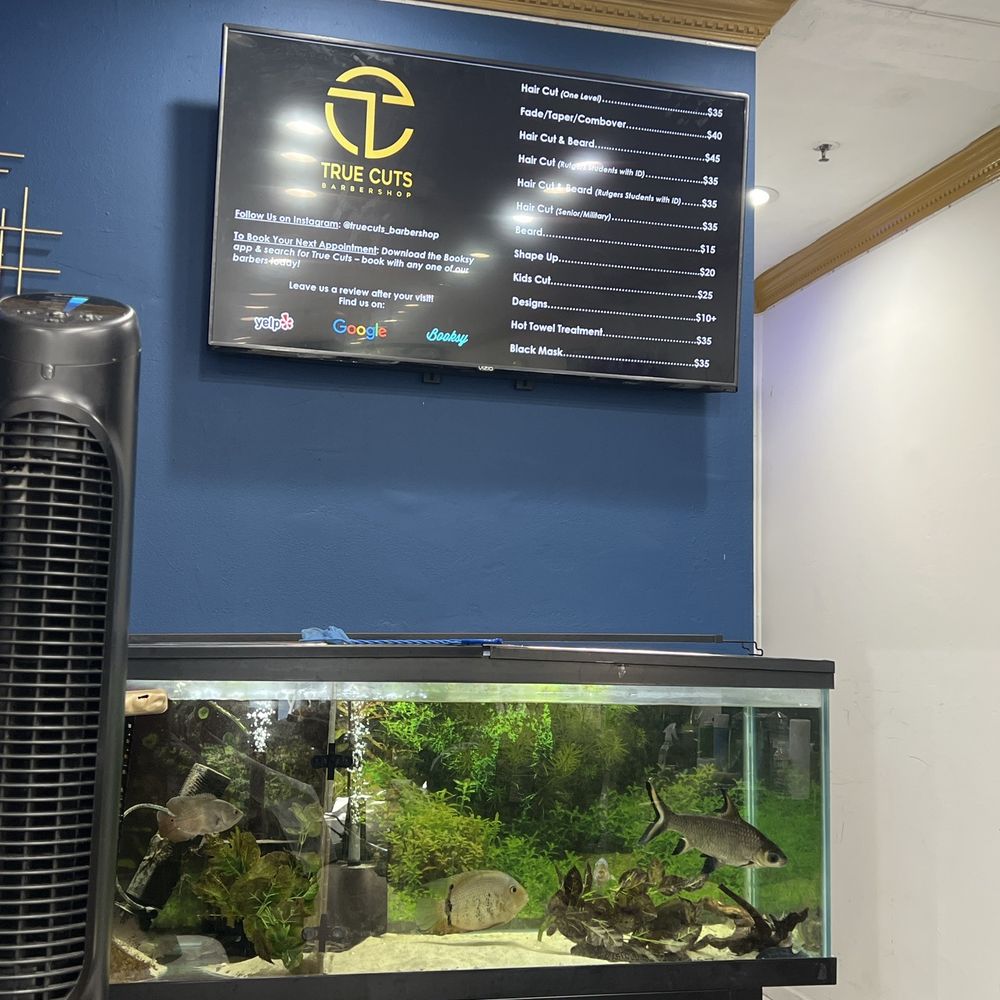 True Cuts Barbershop - Fish tank and prices for services - Barbers Near Me - New Brunswick, New Jersey