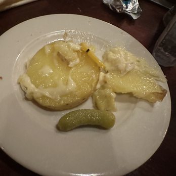 The Rendezvous Grill - Melted Raclette Cheese - potato cheesy goodness - New American Near Me - Welches, Oregon