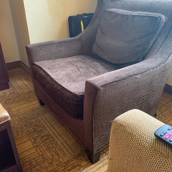Staybridge Suites Longview - Old chair, cat allergies kicked in in the chair. - Hotels Near Me - Longview, Texas