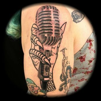 Freak's Tattoo Emporium - Dragon claw microphone first session complete! Artist: Darcee - Tattoo Near Me - Henderson, Nevada