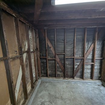 Premium Termite & Pest Control - AFTER: Backwall after cleanup of insulation, shelving, and paneling, then sanitizing - Pest Control Near Me - Long Beach, California Premium Termite & Pest Control - AFTER: Backwall after cleanup of insulation, shelving, and paneling, then sanitizing - Pest Control Near Me - Long Beach, California