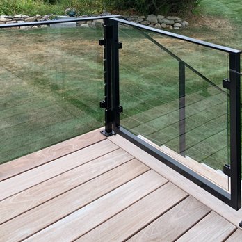 AGS Stainless - AGS manufactures custom railing systems. This cable and glass railing install has a custom-designed gate and a black powder coat handrail. - Decks & Railing Near Me - Bainbridge Island, Washington AGS Stainless - AGS manufactures custom railing systems. This cable and glass railing install has a custom-designed gate and a black powder coat handrail. - Decks & Railing Near Me - Bainbridge Island, Washington