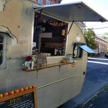 Happy  Belly -  food truck parked on the side of the road - Food Trucks Near Me