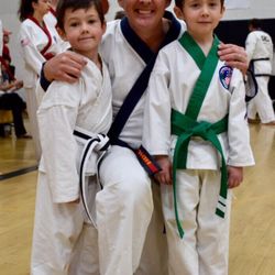 Center For Martial Arts - Master Pattison with the boys after the belt test