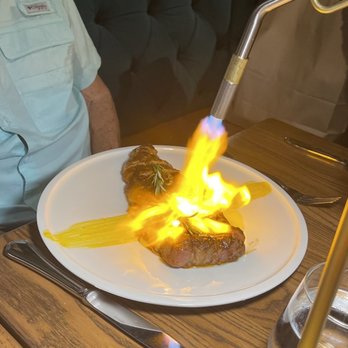 Platea - New York strip with charred rosemary. - Peruvian Near Me - Pinecrest, Florida Platea - New York strip with charred rosemary. - Peruvian Near Me - Pinecrest, Florida