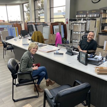 Felikian's Carpet One Floor & Home - two people sitting at a counter in a store - Carpeting Near Me - Pasadena, California Felikian's Carpet One Floor & Home - two people sitting at a counter in a store - Carpeting Near Me - Pasadena, California