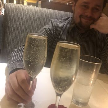 333 Pacific - Champagne and rose, petal, romantic, set up for Valentine's Day - Steakhouses Near Me - Oceanside, California