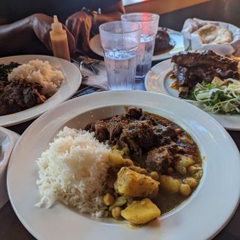 Pam's Caribbean Kitchen - Goat curry - Trinidadian Near Me - Seattle, Washington Pam's Caribbean Kitchen - Goat curry - Trinidadian Near Me - Seattle, Washington