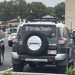 This Christian Nationalist "NOT LIB" (Toyota??!) parked here every day. Manager? Not a good look.