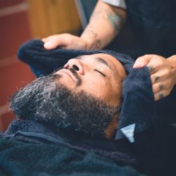 Bottima Barbershop - Relax and enjoy a warm hot towel service.