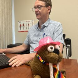 Thunder Pain and Wellness - Dr. Thunder is always researching the best care options -- with Wally the Comfort Walrus by his side, of course.