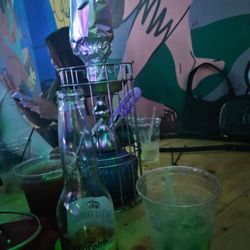 Areito Bar & Grill - Our drinks at Areito...Corona Light, Tito's with soda and lime, wine.