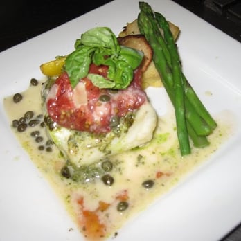 Max's Grill - Grilled Halibut with Basil Pesto Crusted, Capers, and White Wine Butter (Seasonal) - Seafood Near Me - Pacific Grove, California Max's Grill - Grilled Halibut with Basil Pesto Crusted, Capers, and White Wine Butter (Seasonal) - Seafood Near Me - Pacific Grove, California