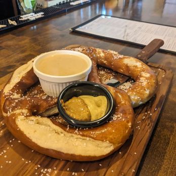 Berliner Beerhall - Pretzel with beer cheese and a side of mustard - German Near Me - Tacoma, Washington Berliner Beerhall - Pretzel with beer cheese and a side of mustard - German Near Me - Tacoma, Washington