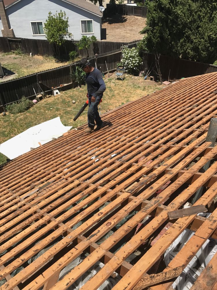 Slide of Husky Roofing