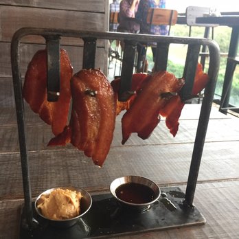 Uncle Jack's Meat House - Bacon strips with peanut butter sauce! It is so good! - Steakhouses Near Me - Duluth, Georgia