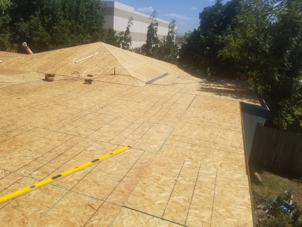 Slide of Monumental Roofing Services