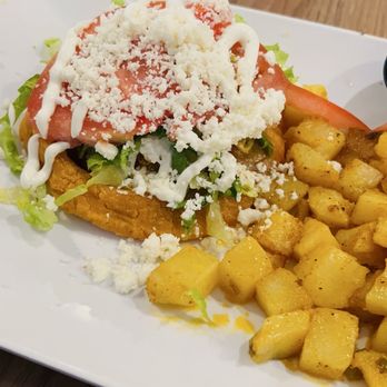Chilaquiles Modern Kitchen - Breakfast sopes with chicken tinga - Bars Near Me - Mesa, Arizona Chilaquiles Modern Kitchen - Breakfast sopes with chicken tinga - Bars Near Me - Mesa, Arizona
