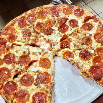 Donatello's Restaurant - Large pepperoni and sausage - Pizza Near Me - Niagara Falls, New York Donatello's Restaurant - Large pepperoni and sausage - Pizza Near Me - Niagara Falls, New York