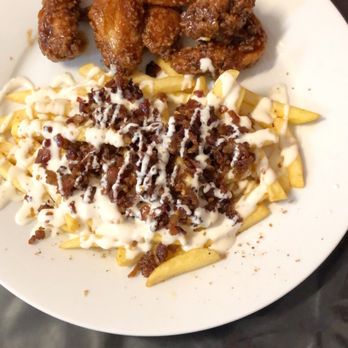 Heard Dat Kitchen - Fried Chicken Wings (forgot the sauce) and Dat Fries - Cajun/Creole Near Me - New Orleans, Louisiana Heard Dat Kitchen - Fried Chicken Wings (forgot the sauce) and Dat Fries - Cajun/Creole Near Me - New Orleans, Louisiana