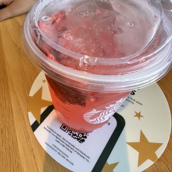 Starbucks - a drink in a plastic cup on a table - Coffee & Tea Near Me - Niagara Falls, Ontario Starbucks - a drink in a plastic cup on a table - Coffee & Tea Near Me - Niagara Falls, Ontario